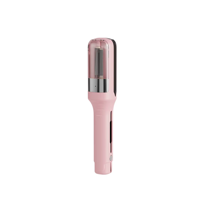 A handheld pink hair trimmer with a metallic part visible at the tip.
