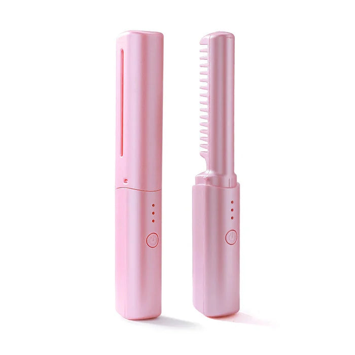 Pink hair straightener and comb on a white background